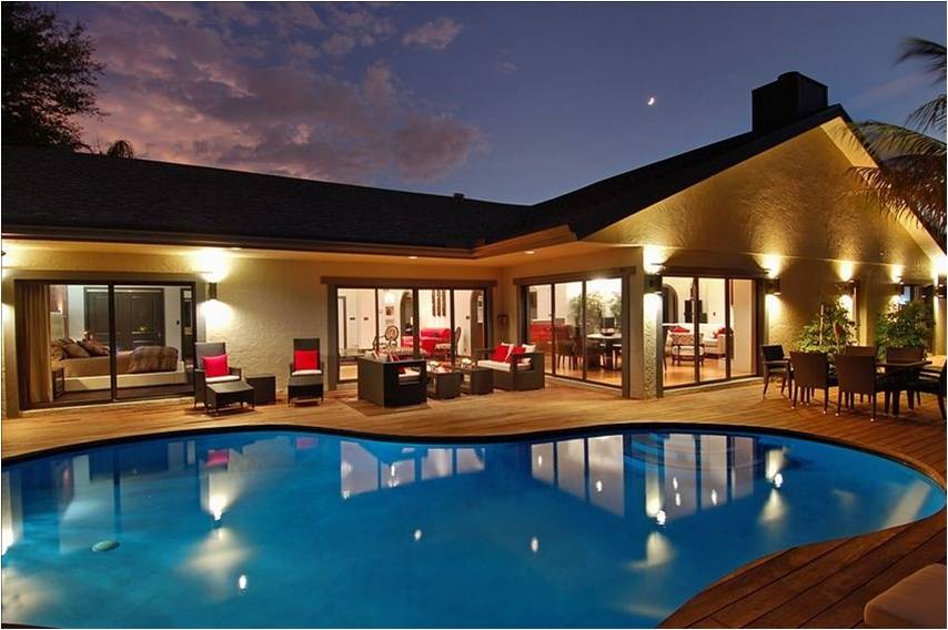House and pool at night