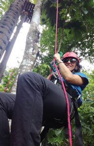 Ana Maria Torres climbing a tree