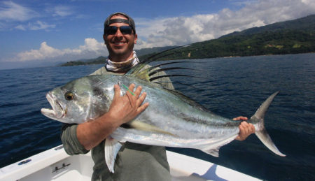 Man holding large roosterfish