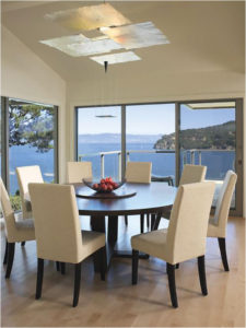 Large dining table with ocean view