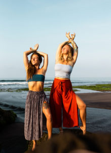 Women posing on a beach