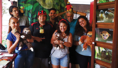 Volunteers with stuffed animals