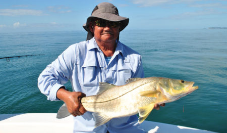 Man holding a snook