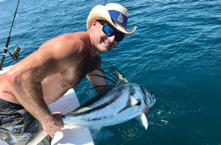 MAN releasing a roosterfish